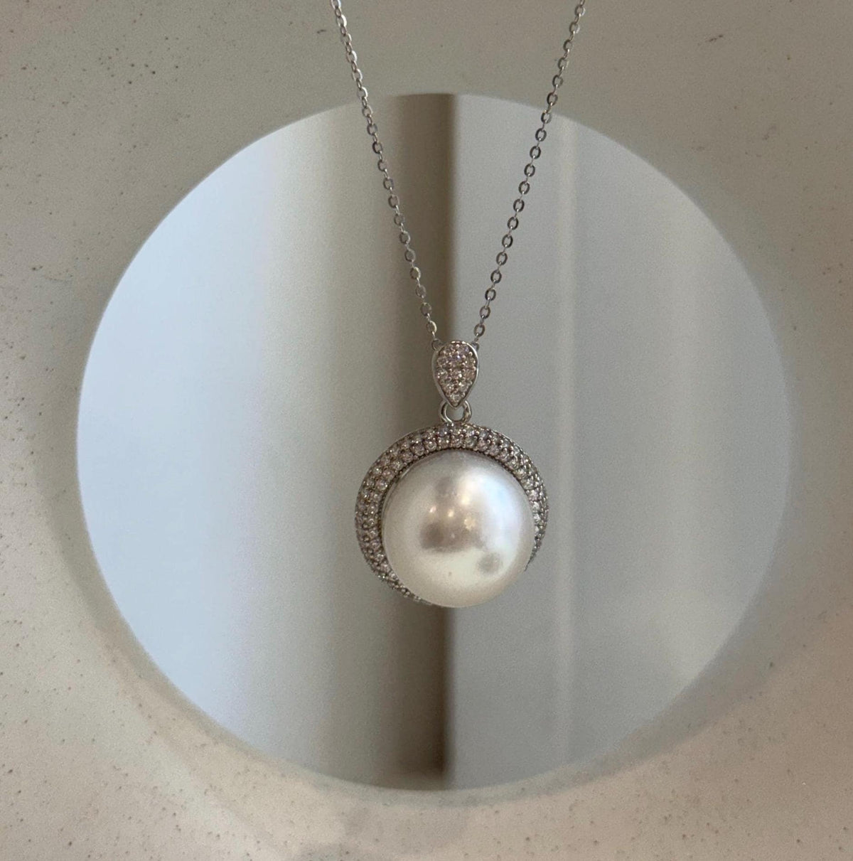 Australian white South Sea pearl pendant with mirror luster and S925 sterling silver setting.