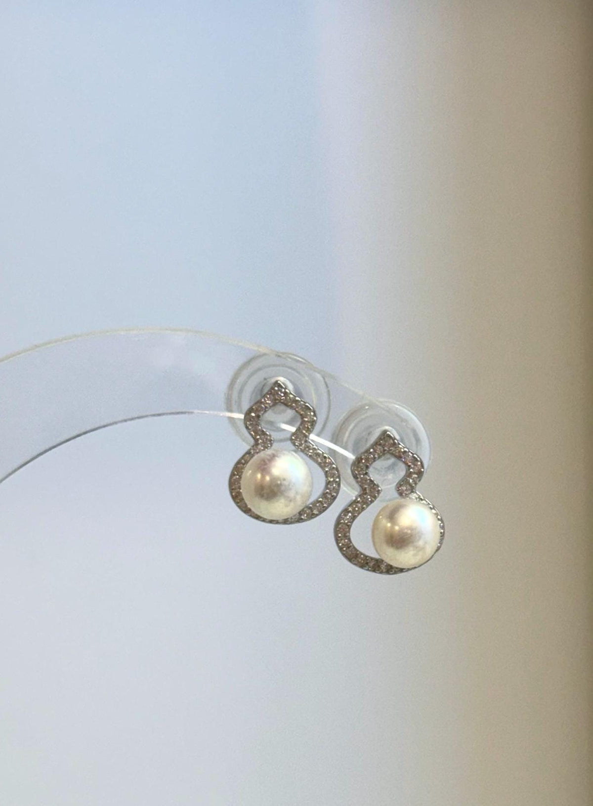 Pair of freshwater pearl studs featuring a delicate gourd design