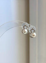 Mirror-luster white pearls set in sterling silver gourd earrings