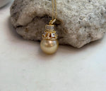 Close-up of the genuine golden South Sea pearl and its mirror-like luster.