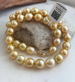 Golden South Sea pearl necklace photographed to show the full strand