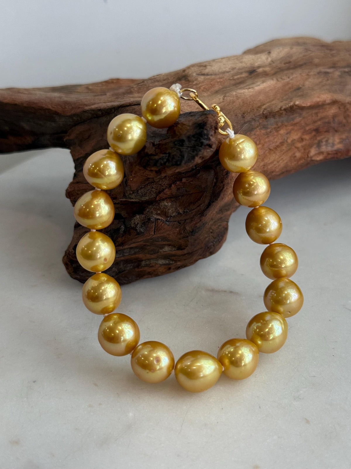 S925 sterling silver clasp on a golden Edison freshwater pearl bracelet.