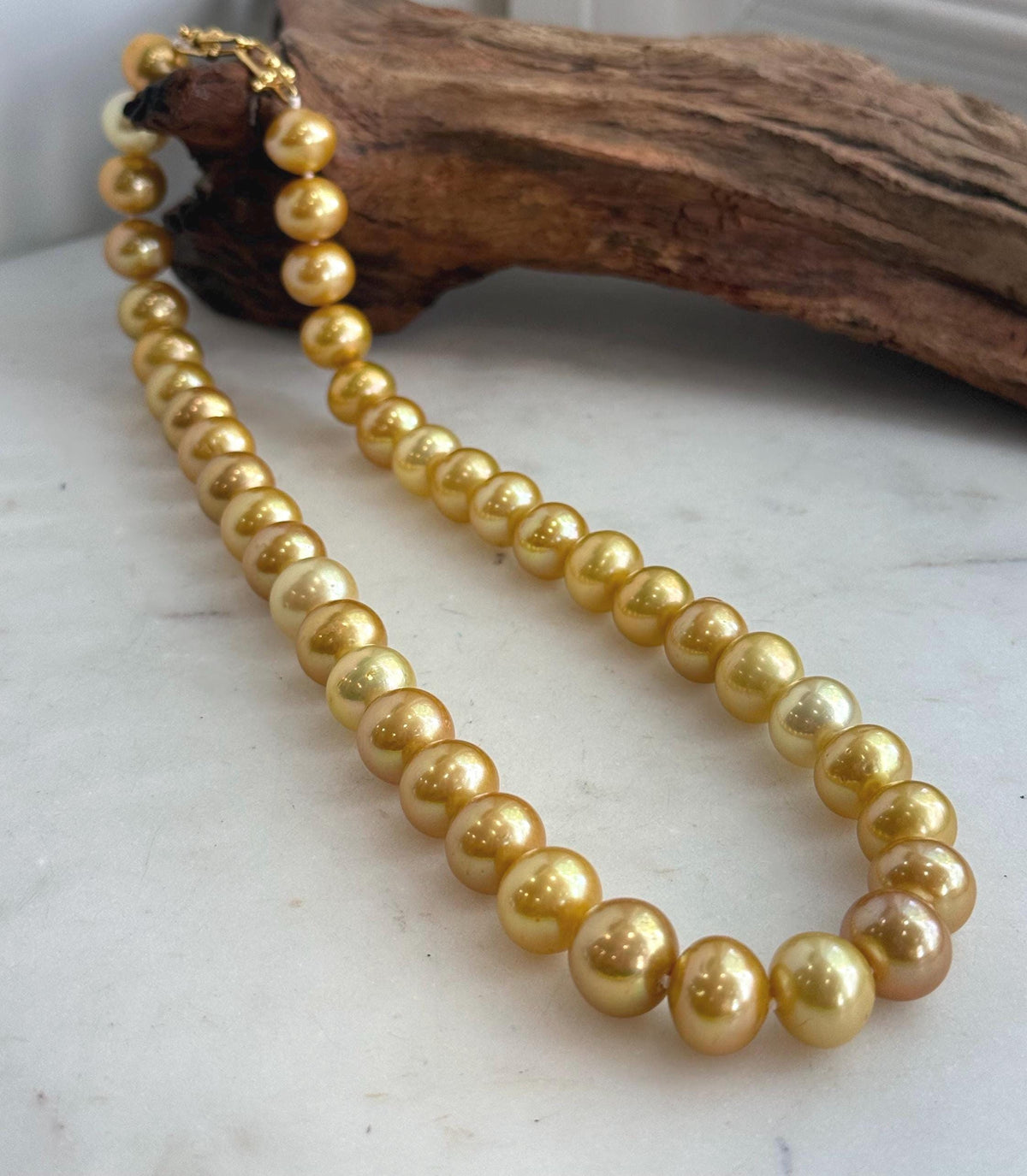 Golden Edison pearl necklace with 41 genuine freshwater pearls and a rich, warm glow.
