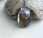 Front view of the iridescent Mabe pearl pendant necklace