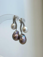 Elegant pearl drop earrings combining rose purple and white Keshi pearls.