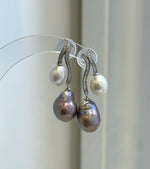 Detailed view of the crystal accents and S925 sterling silver settings on Keshi pearl earrings.