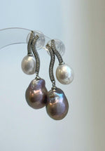 Rose purple Keshi pearls paired with white baroque pearls in a graceful drop design.