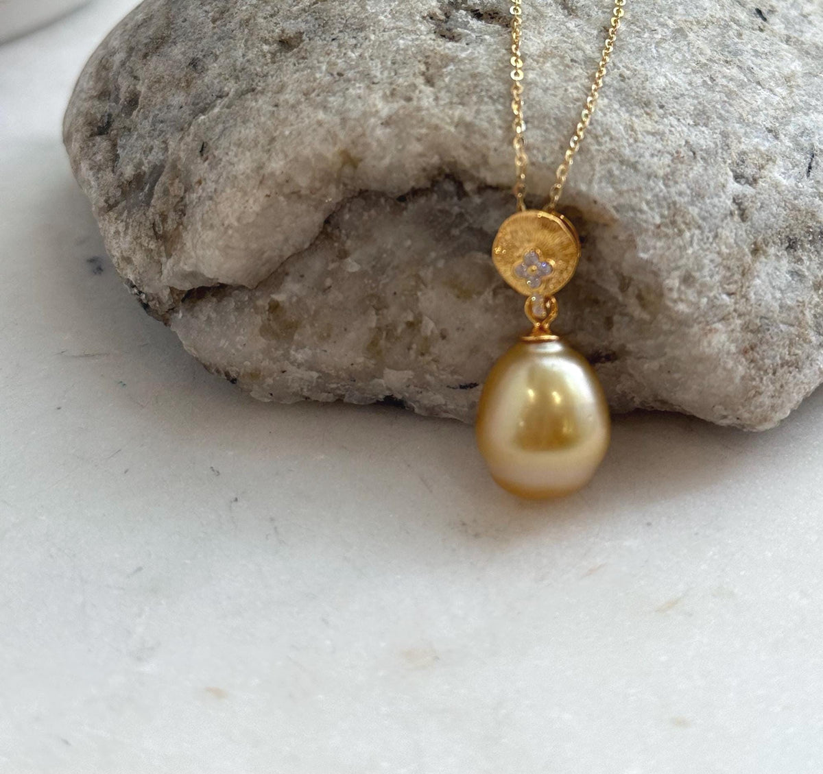 Genuine golden saltwater pearl pendant with a rich deep tea gold colour.