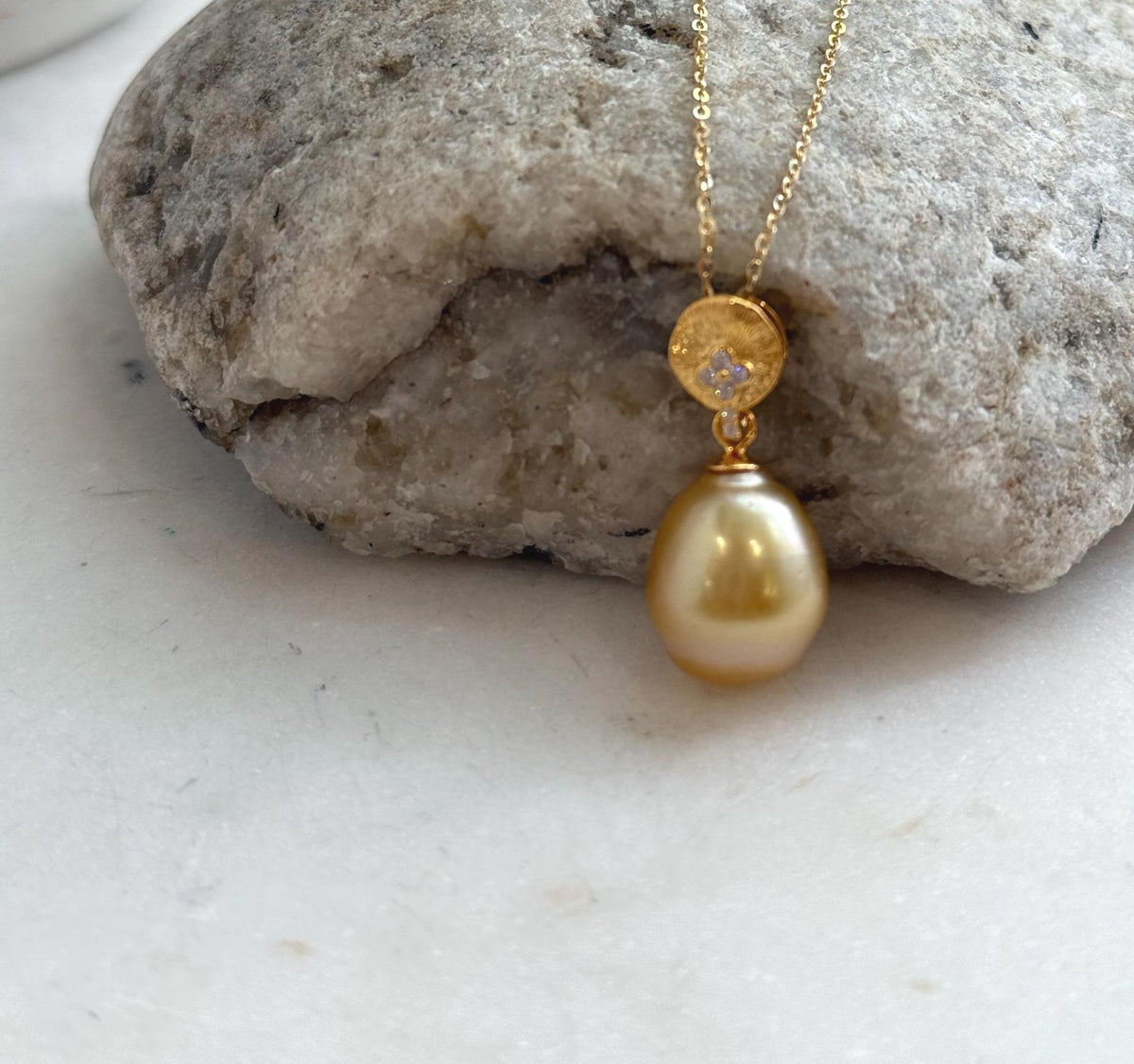 Deep tea gold ocean pearl set in S925 sterling silver.