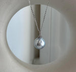 Australian silver blue South Sea pearl pendant with iridescent overtones and an S925 sterling silver setting.