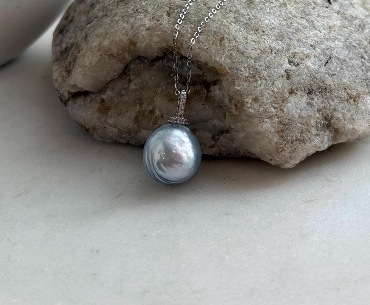 Australian South Sea pearl jewelry with extreme luster and a sterling silver setting.