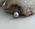 Australian South Sea pearl jewelry with extreme luster and a sterling silver setting.