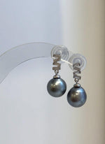 Minimalist pearl drop earrings crafted with S925 sterling silver.