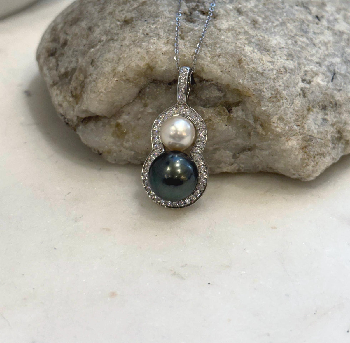 Gourd-shaped pearl pendant with two lustrous saltwater pearls and S925 sterling silver.