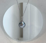 Genuine saltwater Tahitian pearl with a platinum blue color and mirror-like luster