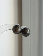 Platinum gray Tahitian pearl stud earrings with mirror luster and S925 sterling silver settings.