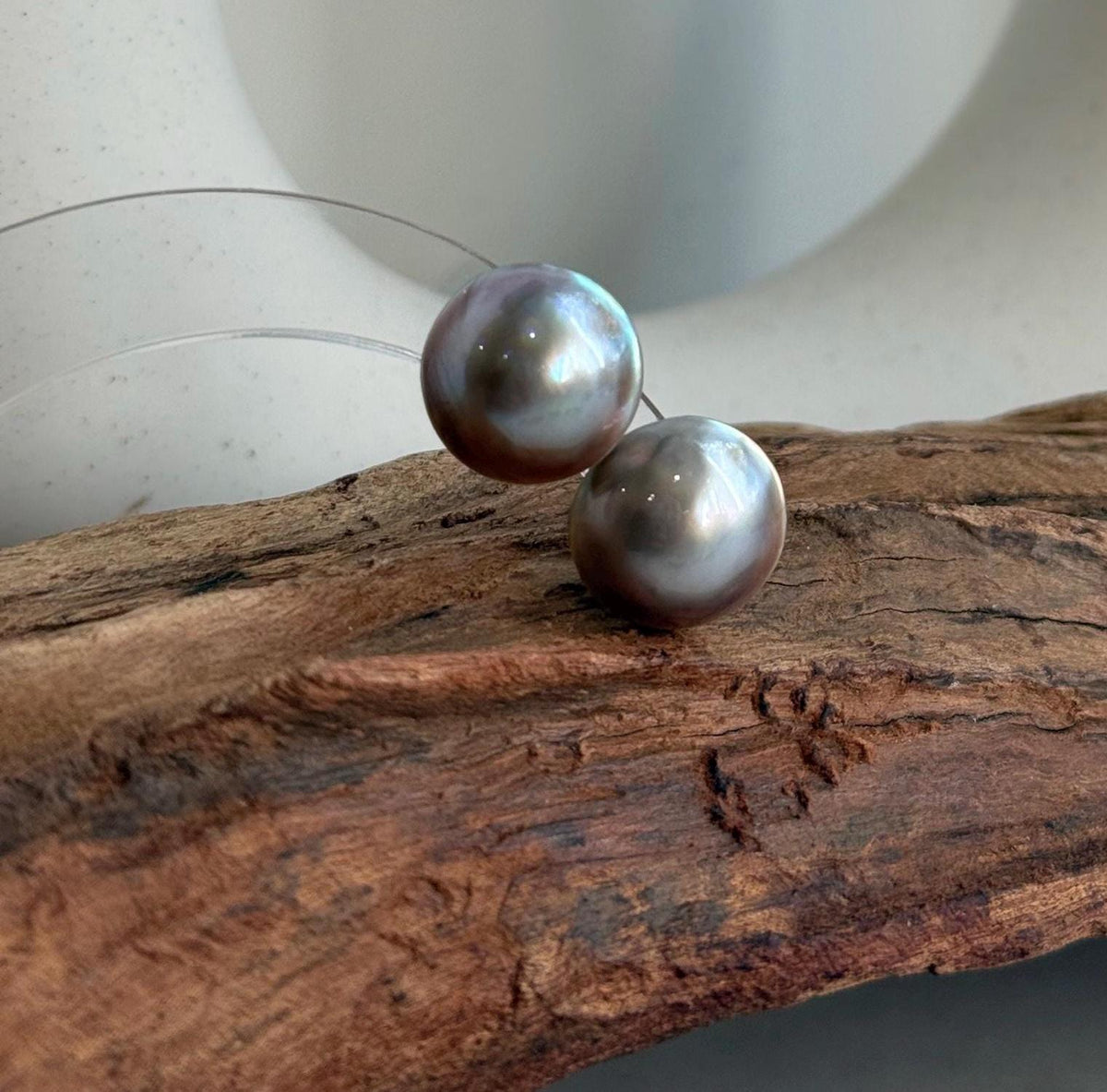 Round iridescent Mabe pearls framed by minimalist S925 sterling silver settings.