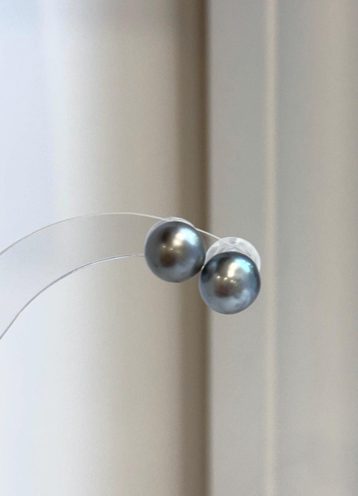 Platinum Tahitian pearl stud earrings in S925 sterling silver.