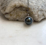 Reflective Tahitian pearl pendant in S925 sterling silver.