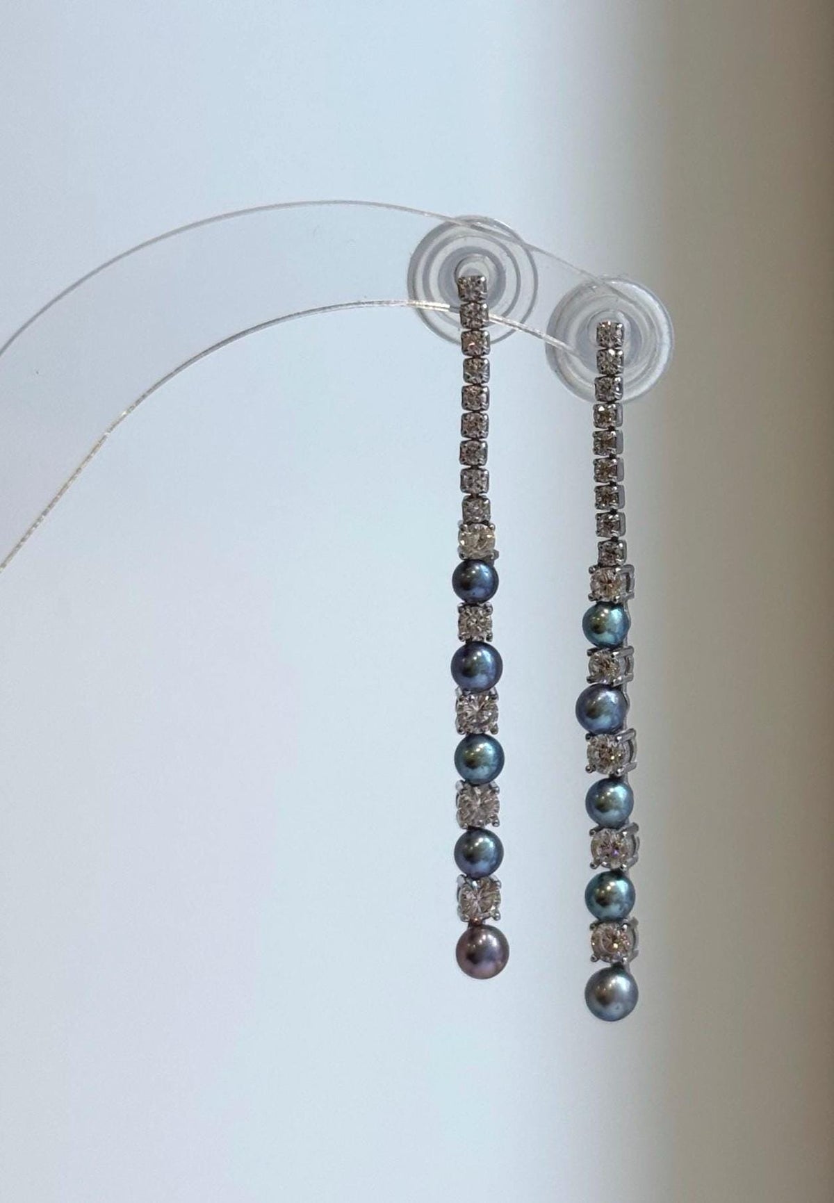 S925 sterling silver earrings with blue and green freshwater pearls.