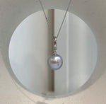 Lustrous silver pearl pendant with minimalist S925 sterling silver setting.