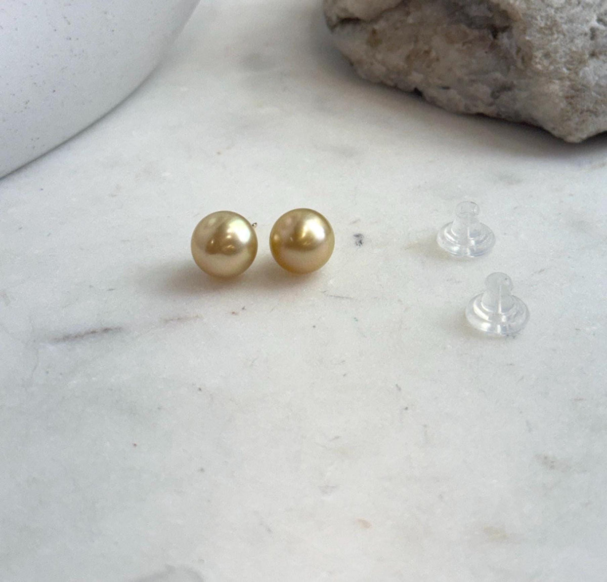 Rich tea gold saltwater pearls set in sterling silver studs.