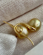 Golden pearl earrings featuring high heel S925 silver hooks.