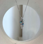 Peacock freshwater pearl leaf pendant in sterling silver