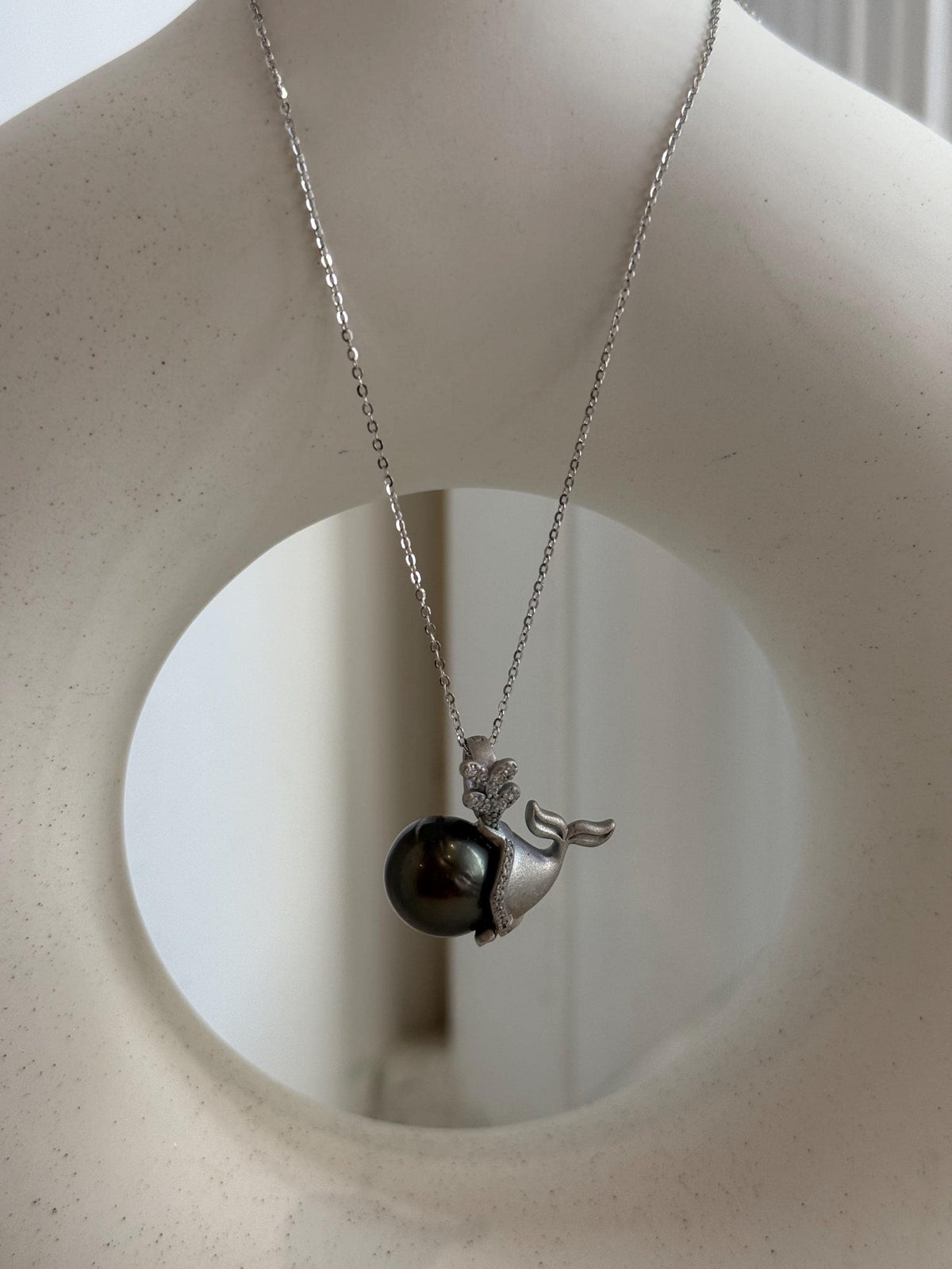 S925 sterling silver mermaid pendant featuring a genuine saltwater pearl.