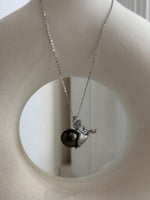 S925 sterling silver mermaid pendant featuring a genuine saltwater pearl.