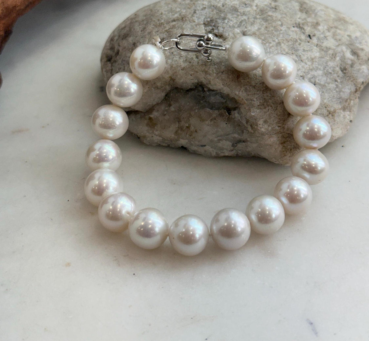 Genuine freshwater pearl bracelet featuring luminous white Edison pearls.