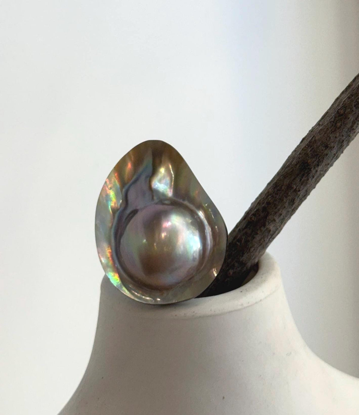 S925 sterling silver ring featuring a rainbow mabe pearl.