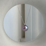Rose lavender pearls with a smooth surface and mirror shine.