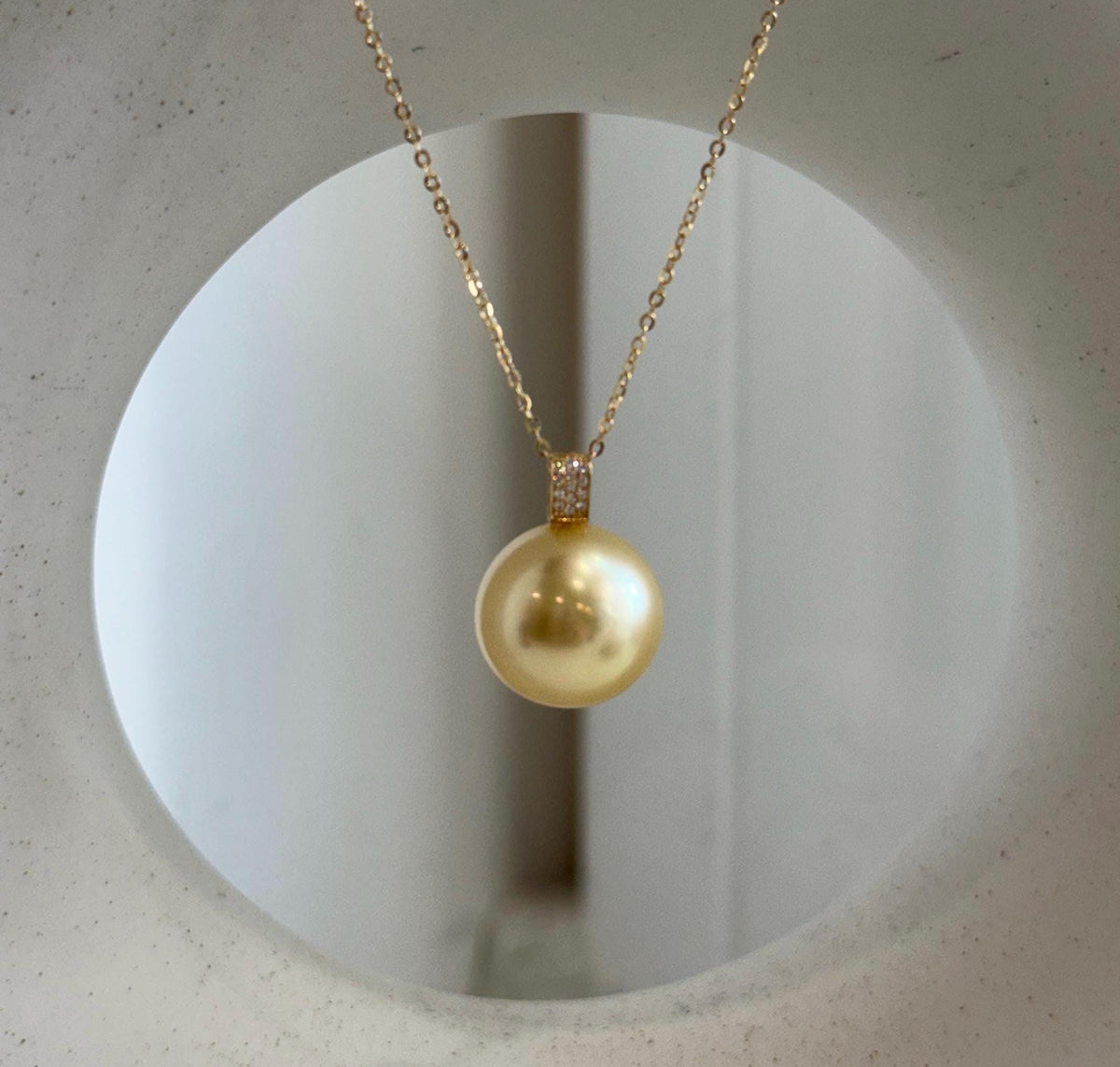 Genuine South Sea pearl pendant in a rich golden color.