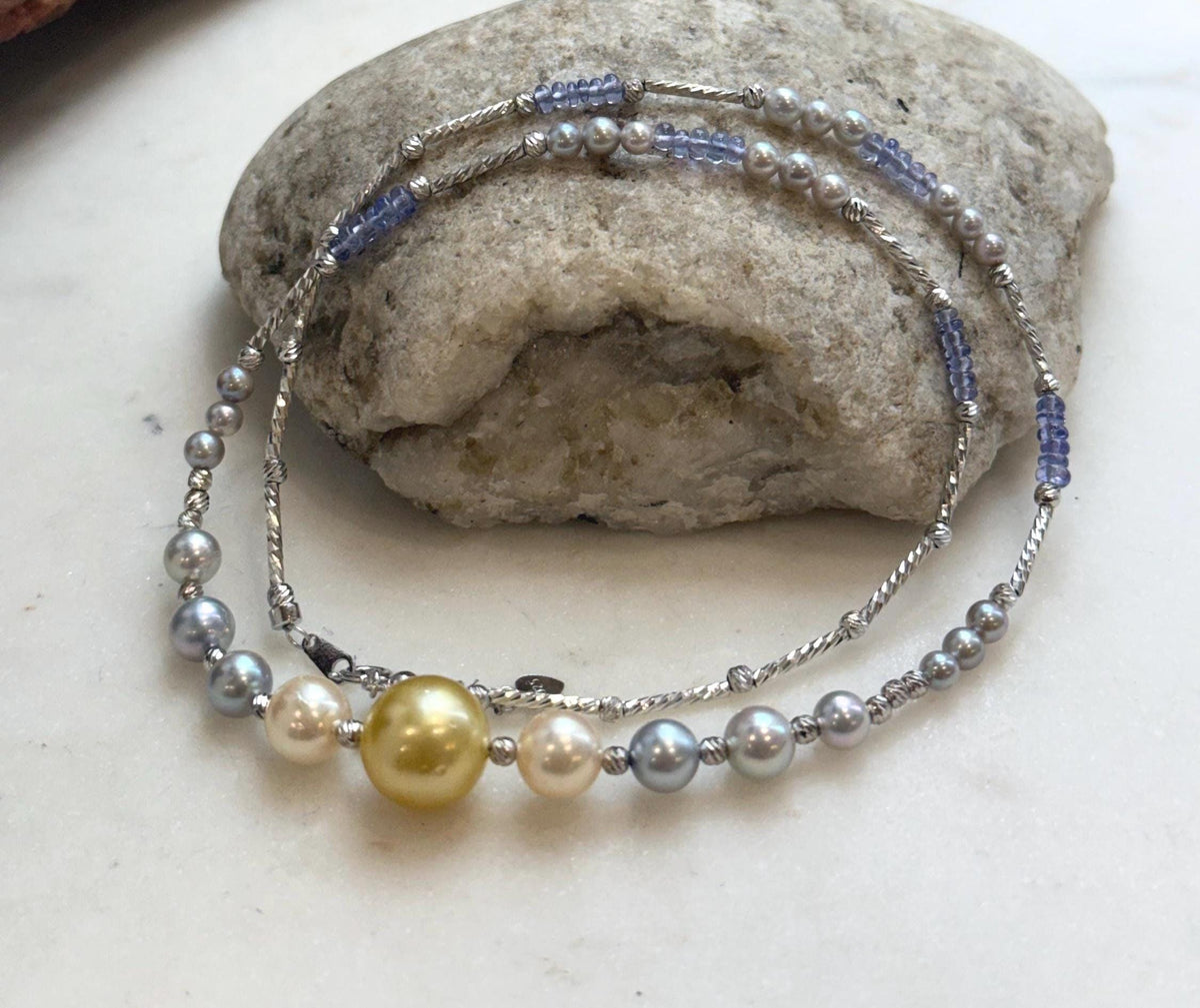 S925 sterling silver necklace with pearl clusters and tanzanite bead sections.