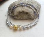 S925 sterling silver necklace with pearl clusters and tanzanite bead sections.