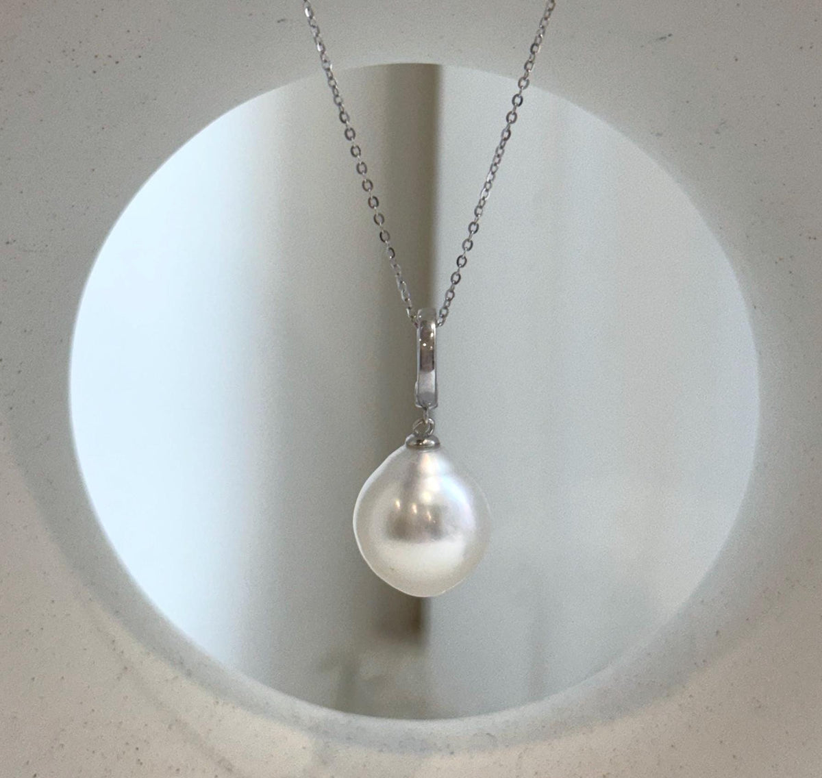 Large ocean pearl pendant with radiant luster.