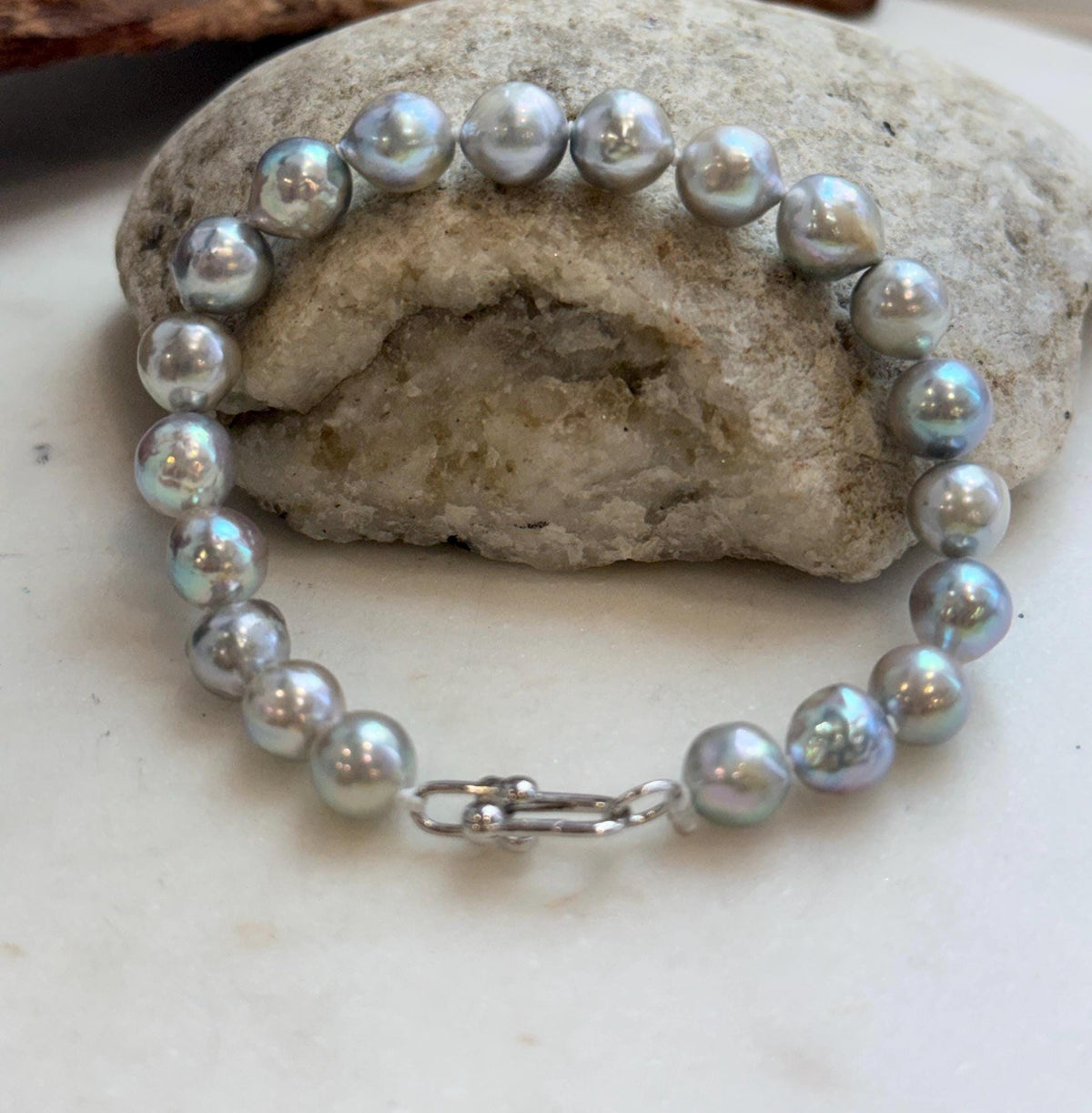 Genuine ocean pearl bracelet with a sterling silver fastening.