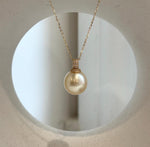 Lustrous champagne gold saltwater pearl in S925 silver.