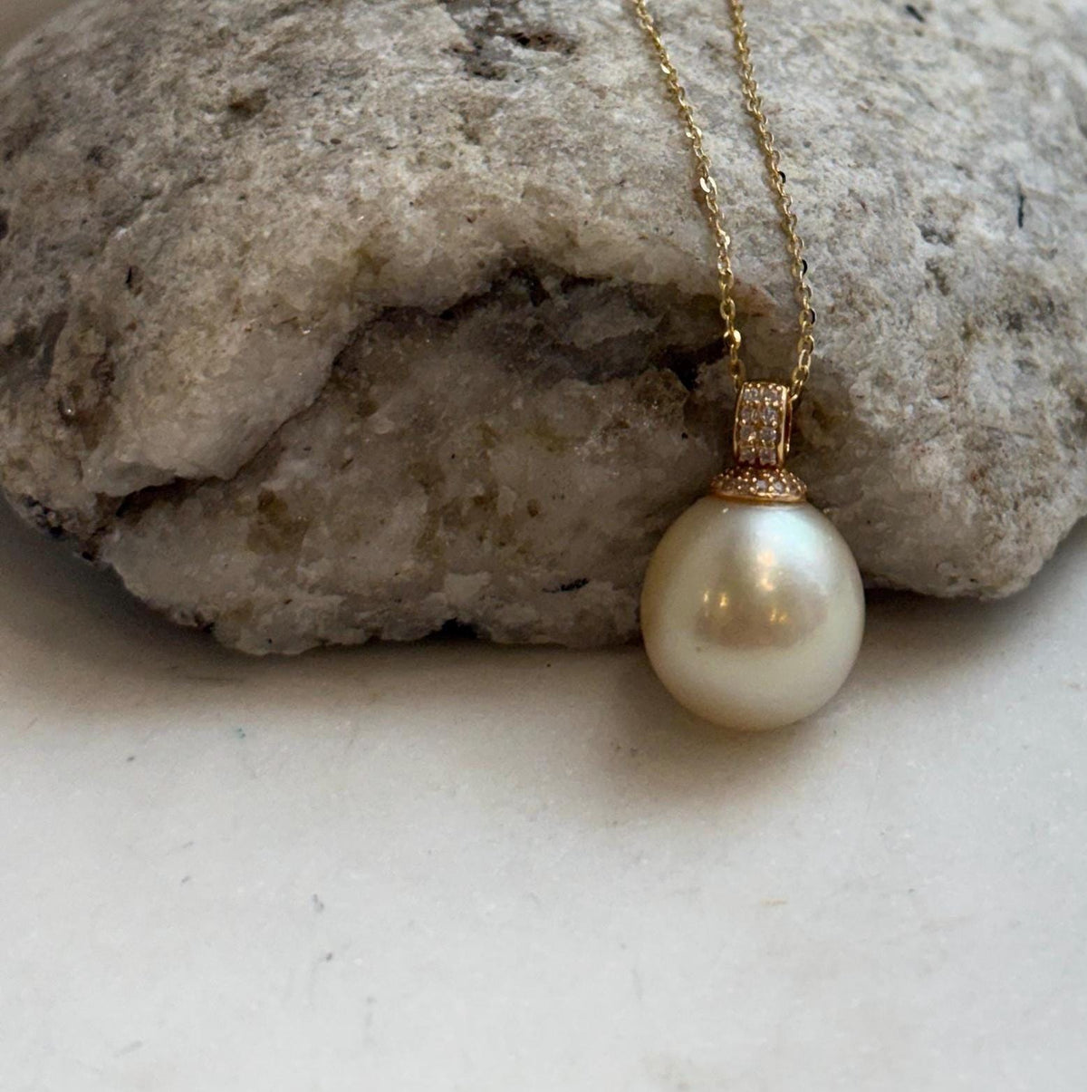 Genuine South Sea pearl pendant with a bright mirrored surface.