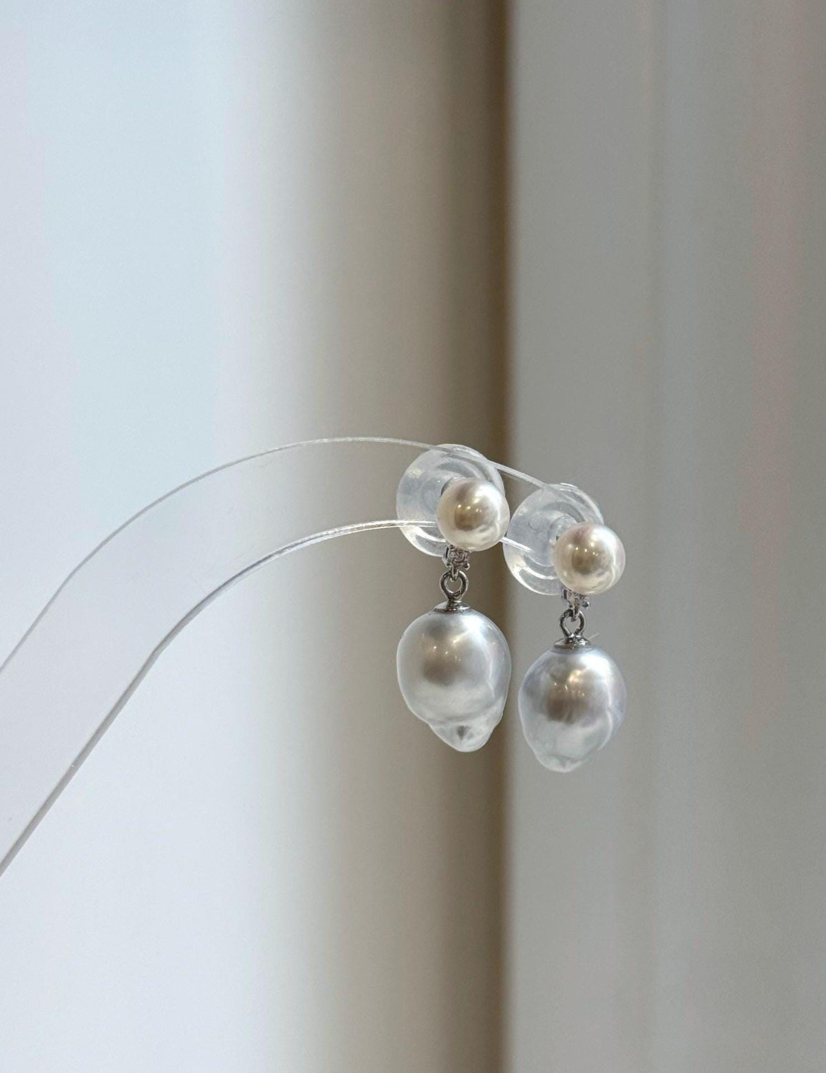 Double pearl earrings with mirror luster and S925 sterling silver fittings.
