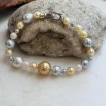 Hand-knotted ocean pearl bracelet featuring a mix of pearl colors and sizes.