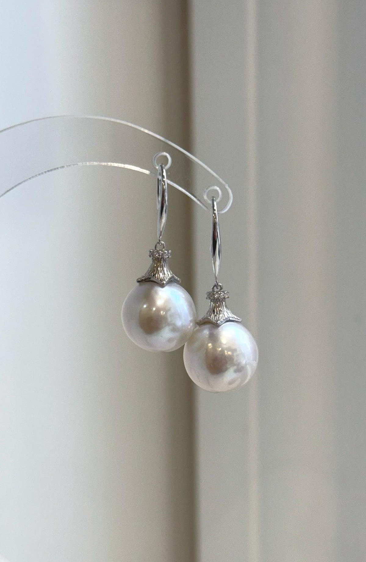 White Edison pearl drop earrings with pink overtones and S925 sterling silver hooks.