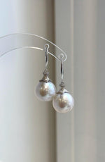 White Edison pearl drop earrings with pink overtones and S925 sterling silver hooks.