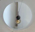 South Sea and Tahitian pearl pendant with a stacked double pearl design.