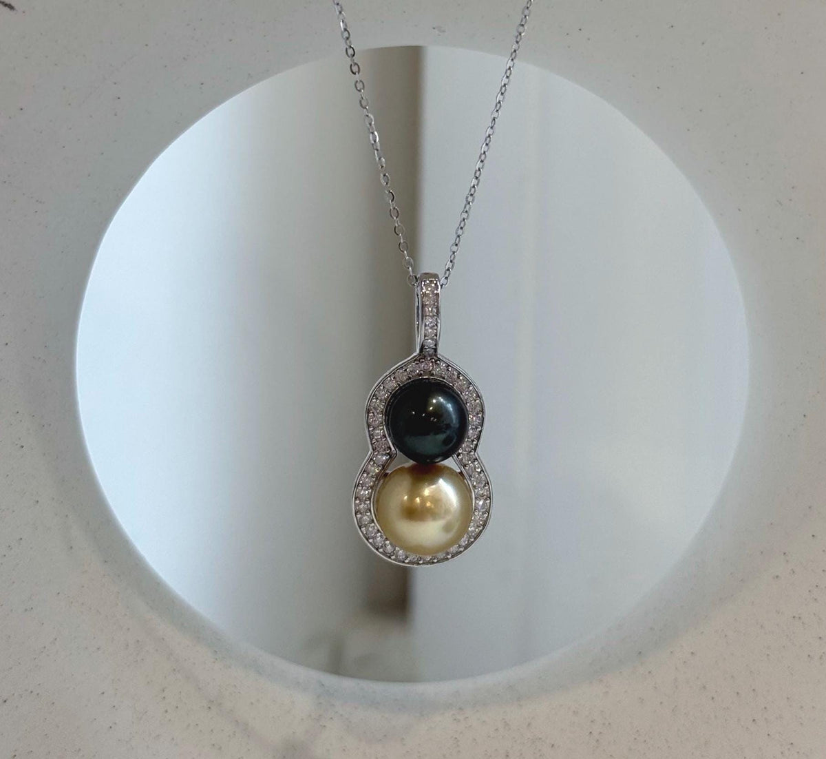 South Sea and Tahitian pearl pendant with a stacked double pearl design.