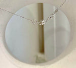 Double saltwater pearl pendant with mirror luster and a gourd silhouette.