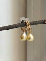 Golden saltwater pearl drop earrings with S925 sterling silver hooks.