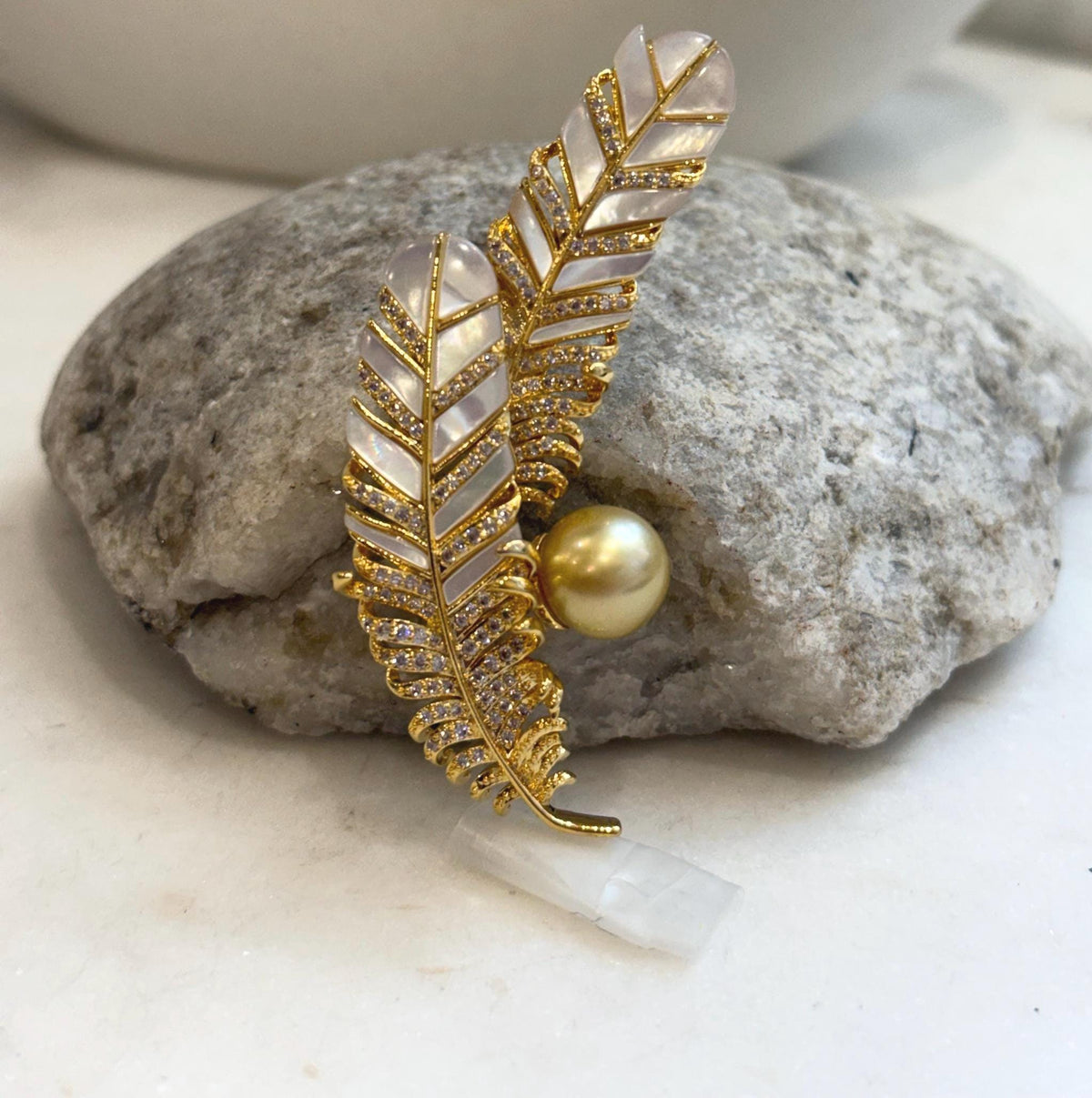 Two-in-one South Sea pearl brooch and pendant with feather details