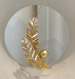 Sparkling feather outlines surrounding white iridescent panels